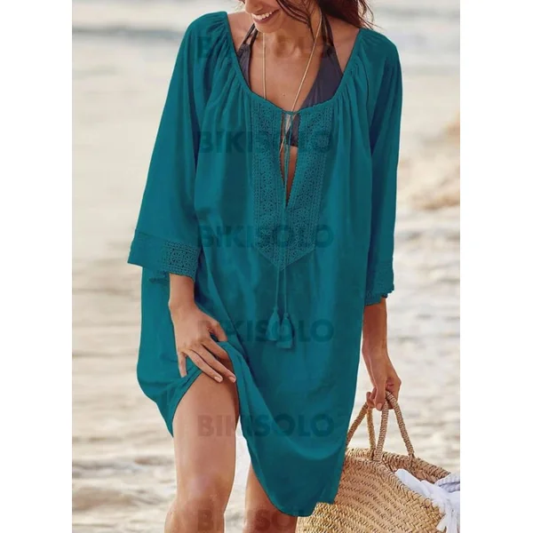 Robe de plage blanche avec cordon de serrage